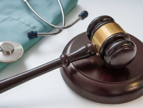 Gavel and stethoscope - Personal injury concept